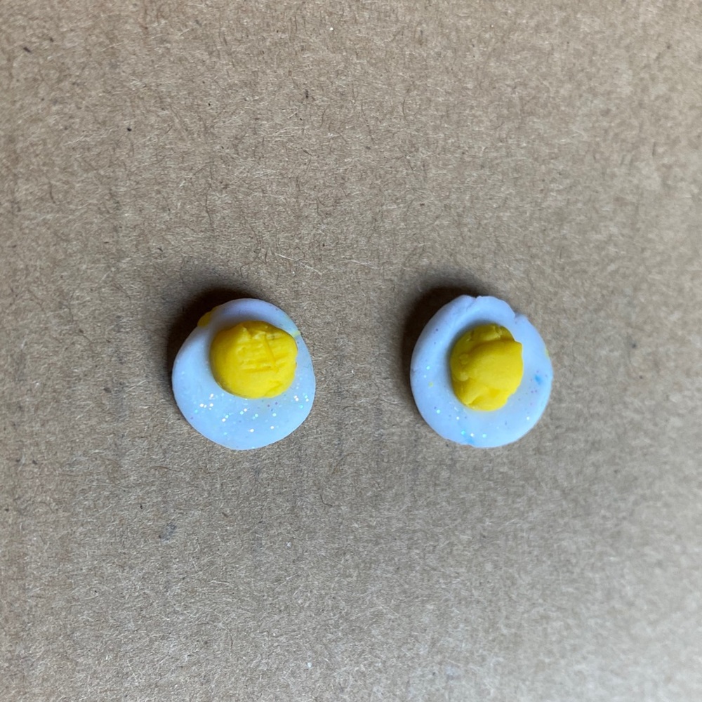 Egg earrings, studs.